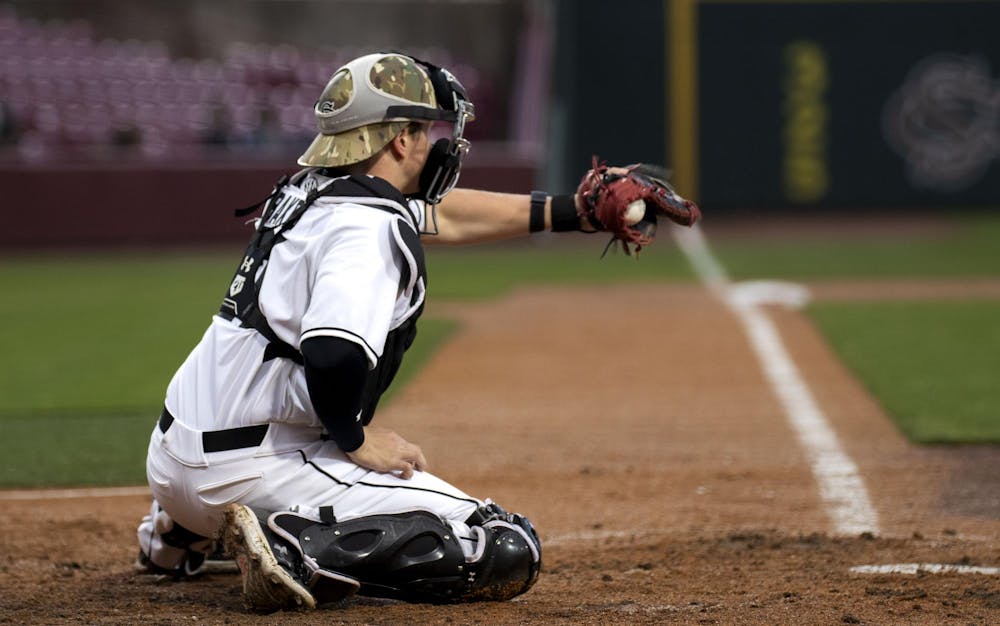 <p>Senior catcher Dalton Reeves catches a strike during South Carolina's 19-14 victory over the Presbyterian Blue Hose on March 26, 2024. Reeves started for the first time this season and made 2 home runs and six RBIs for the Gamecocks.</p>