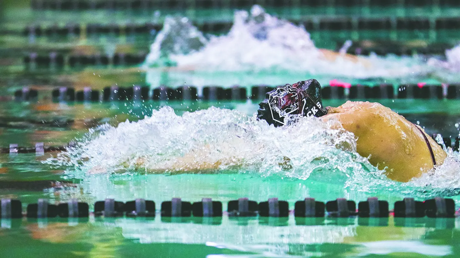 A member of the swim team finishes a lap during the 2020 season. Swim and dive head coach McGee Moody and South Carolina have mutually agreed to part ways.