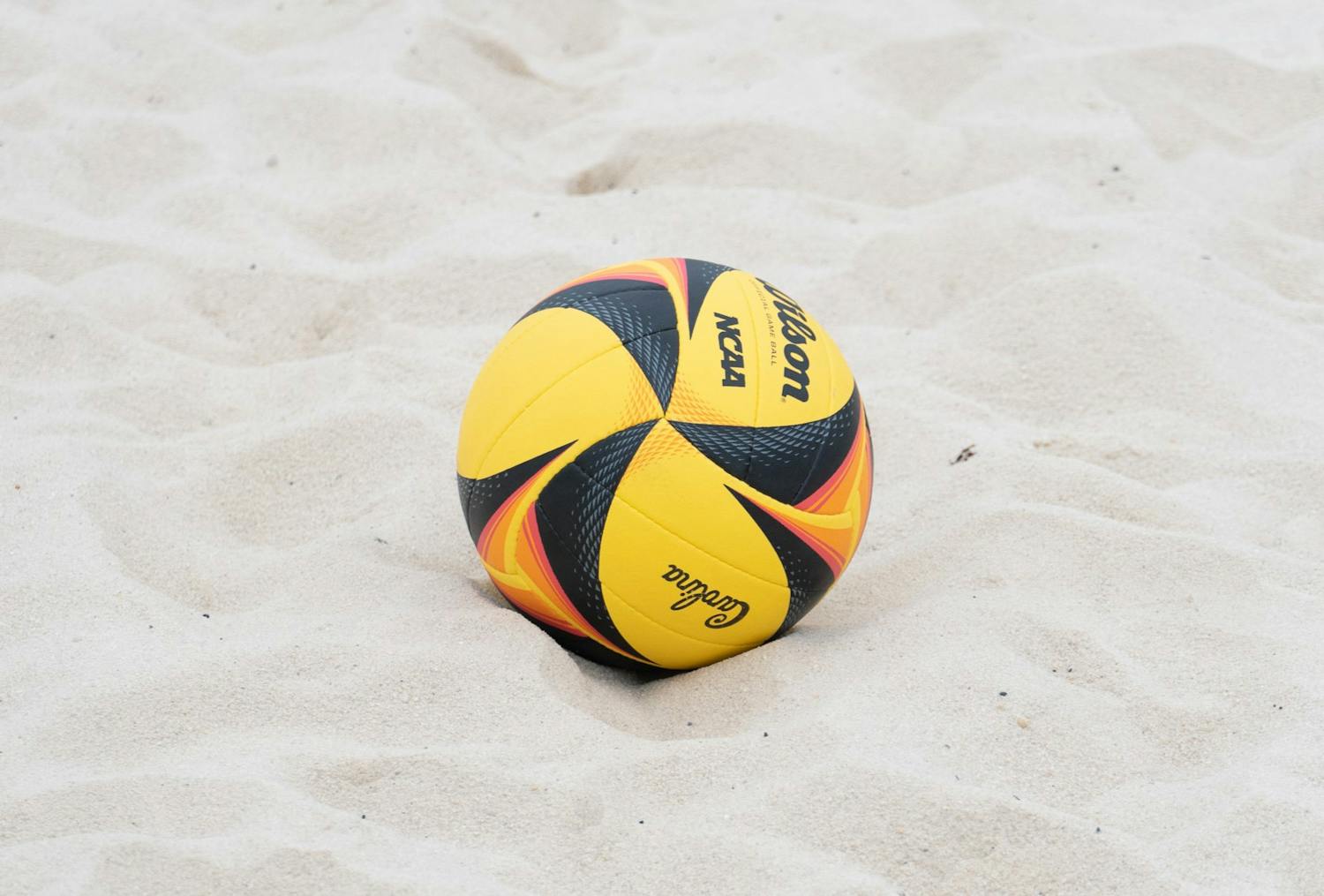 A photo of a volleyball laying in the sand during a practice session at Wheeler Beach on Jan. 29, 2022. The Gamecock beach volleyball team kicks its 鶹С򽴫ý off on Feb. 25, 2023, against California Polytechnic State University in Tallahassee, Florida.&nbsp;