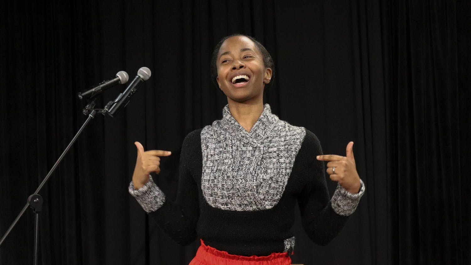 Traci Neal, a USC alumni and NY Times published writer delivers some slam poetry during the UniVerse Popcorn &amp; Poetry event on Jan. 26, 2022. First Lady Patricia Harris-Pastides, creator of UniVERSE, was in attendance during the event.