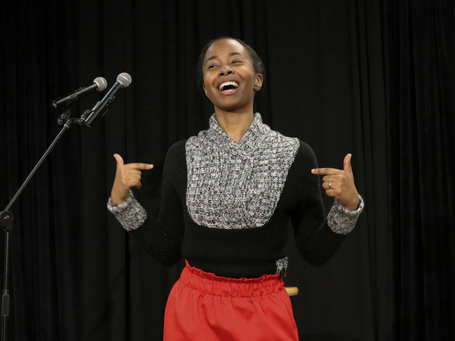 Traci Neal, a USC alumni and NY Times published writer delivers some slam poetry during the UniVerse Popcorn &amp; Poetry event on Jan. 26, 2022. First Lady Patricia Harris-Pastides, creator of UniVERSE, was in attendance during the event.