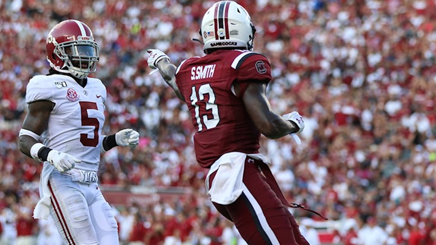 Senior wide receiver Shi Smith points at a Bama player. During his time at USC, Smith gained a total of 174 receptions, 2,204 receiving yards and 13 touchdowns.