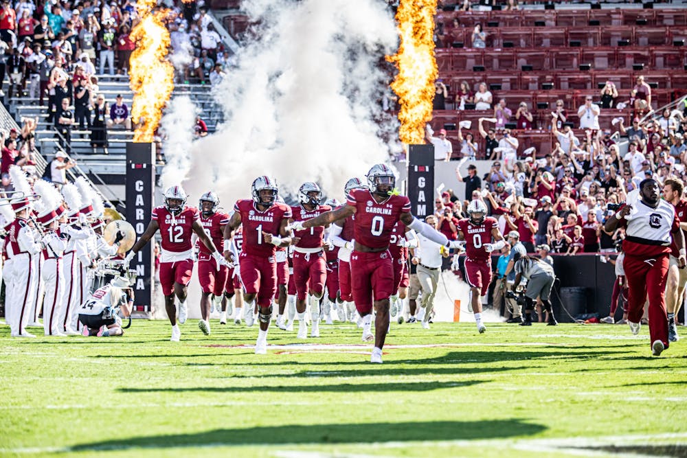 <p>FILE—The Gamecocks rush the field before kick off against Troy on Saturday, Oct. 2, 2021. South Carolina won the game 23-14.</p>