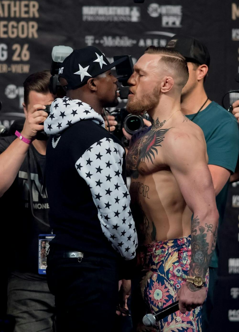 Floyd Mayweather and Conor McGregorstare each other down at a press conference at the Barclays Center in Brooklyn, on July 13, 2017. (Joel Plummer/Zuma Press/TNS)