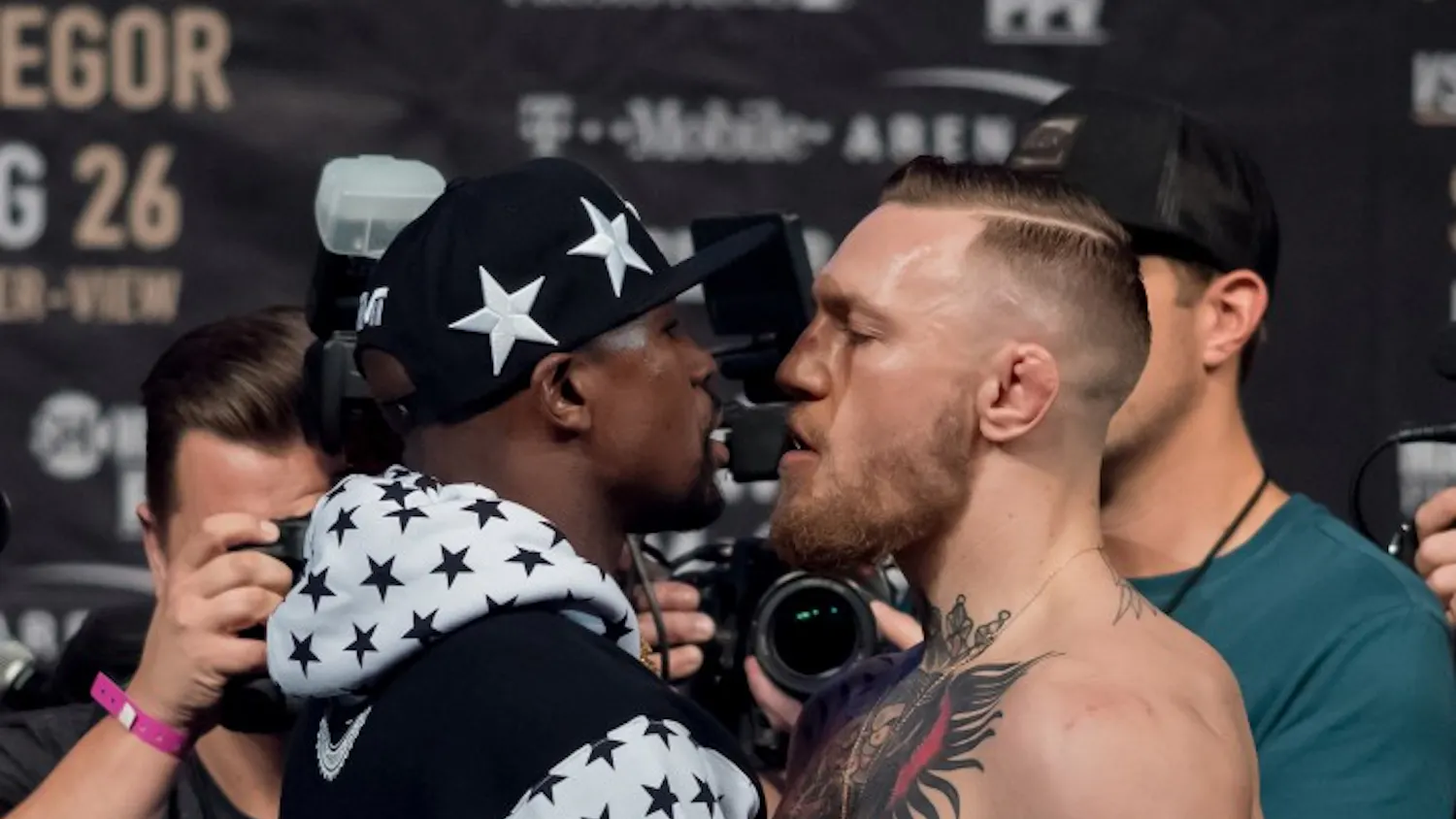 Floyd Mayweather and Conor McGregorstare each other down at a press conference at the Barclays Center in Brooklyn, on July 13, 2017. (Joel Plummer/Zuma Press/TNS)