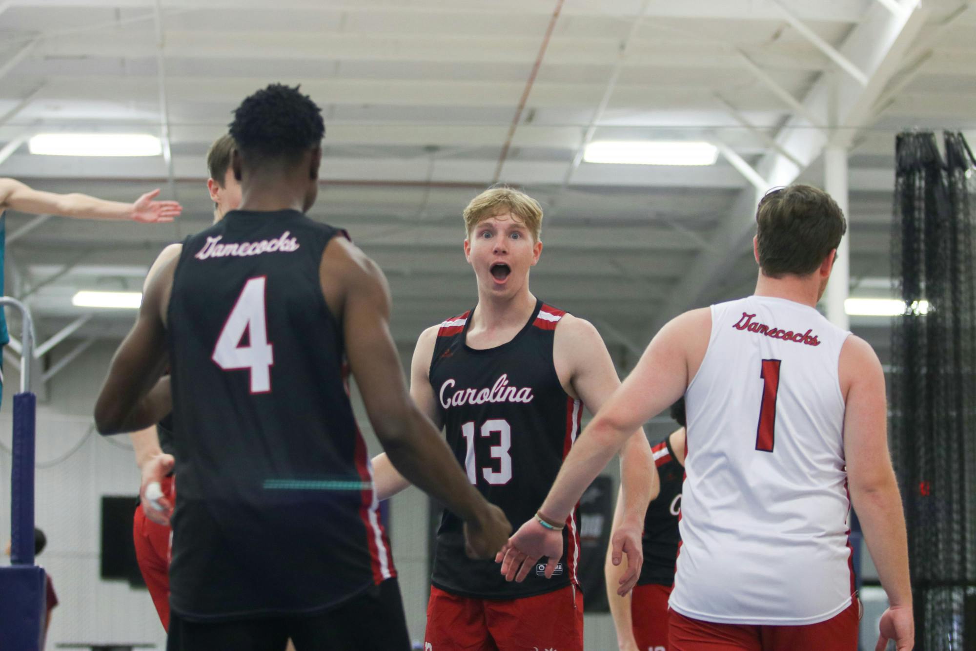 Sophomore setter Ryan Everding looks out in shock as the Garnet team scored an unexpected point during pool play. This particular match against Kennesaw State B was a hard fight until the end, with the Garnet team losing 29-27, and ultimately splitting the match. &nbsp;