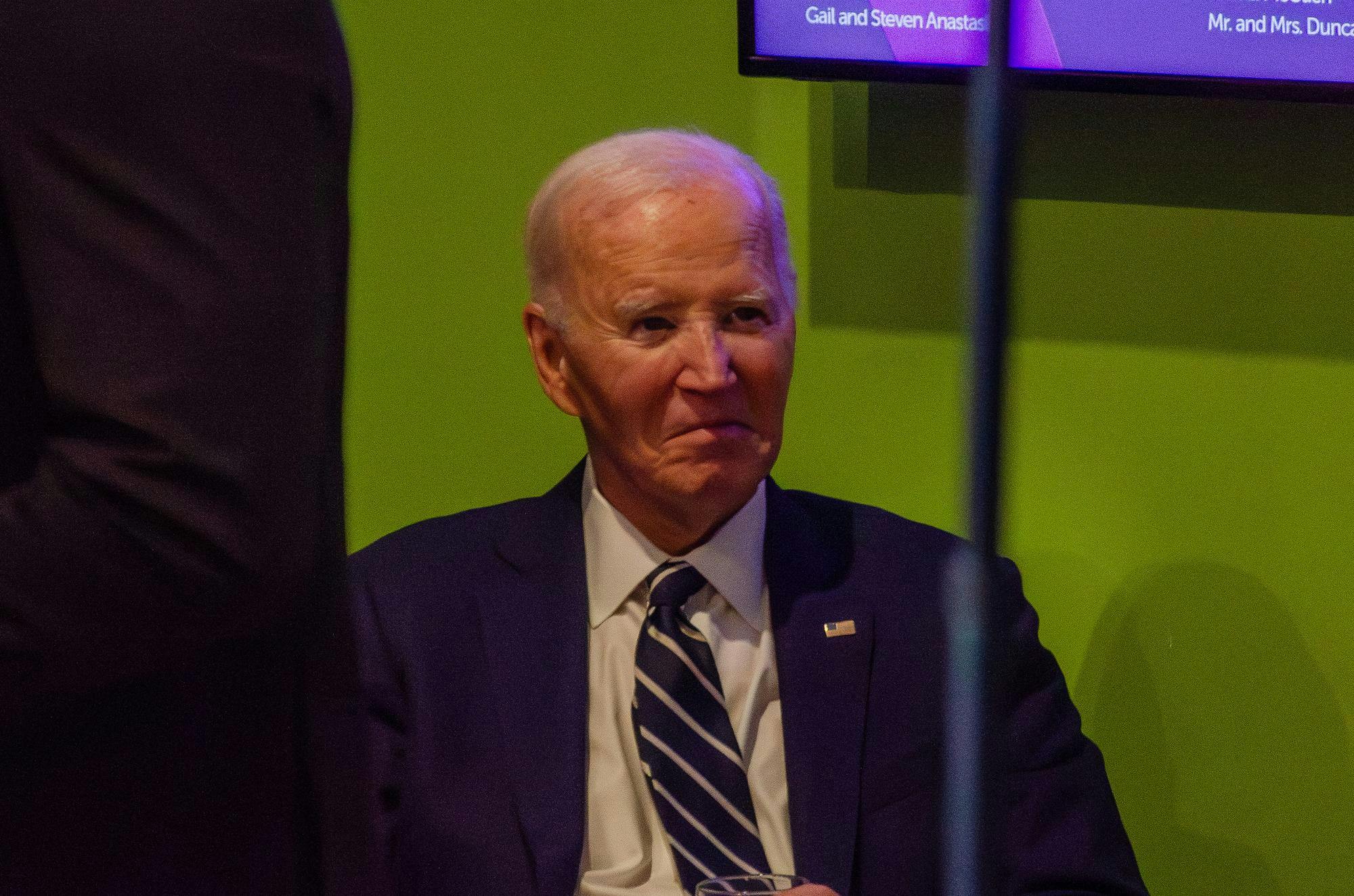 Former President Joe Biden listens to praise by Adair Ford Boroughs, former U.S. attorney for the district of South Carolina, at an event held in his honor at the Columbia Museum of Art at 1515 Main St., Columbia, South Carolina, Feb. 27, 2026. Boroughs was appointed by the president in 2022 and resigned after Donald Trump was made president in 2025, and he now teaches at USC’s Joseph F. Rice School of Law.