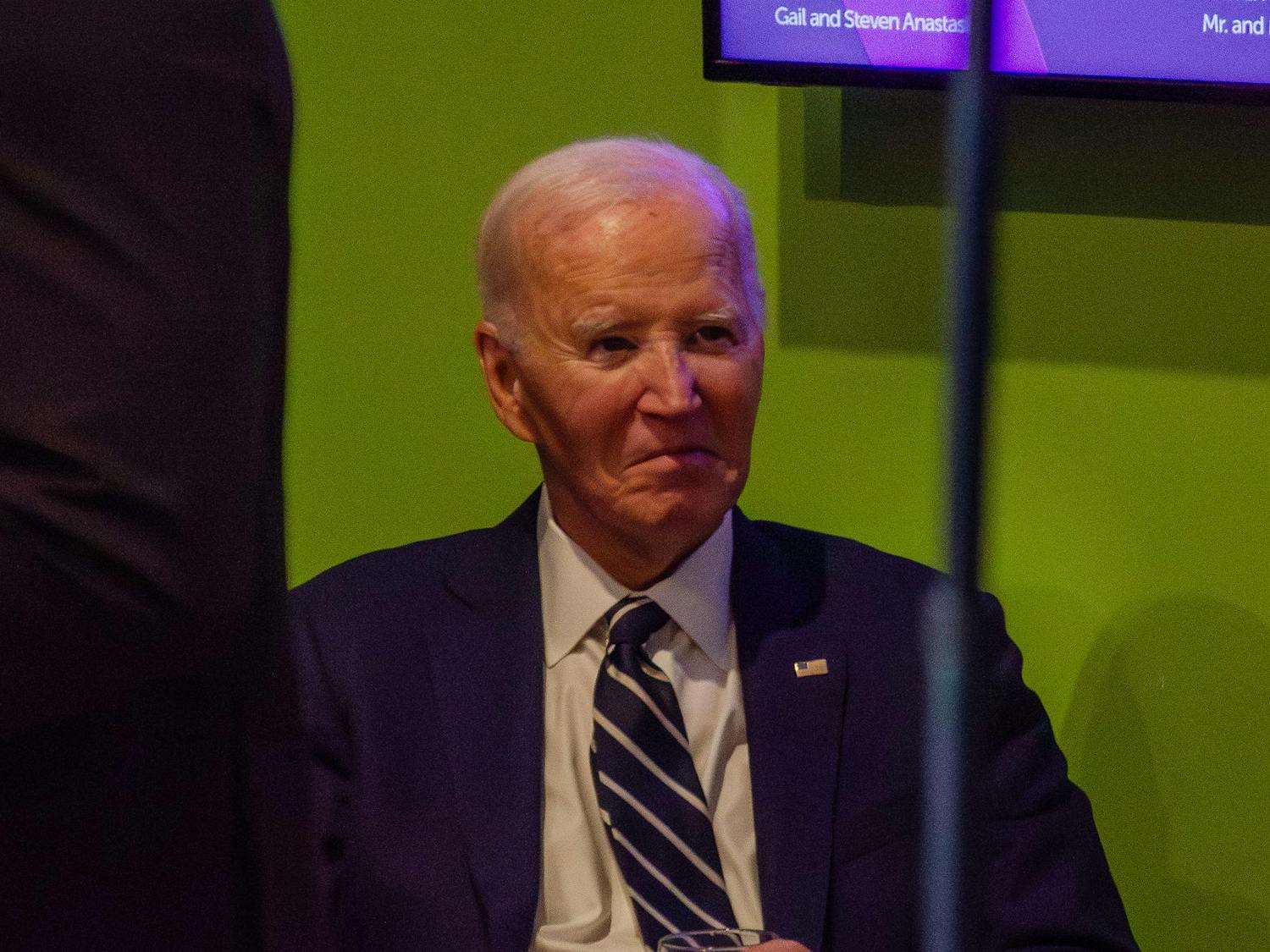 Former President Joe Biden listens to praise by Adair Ford Boroughs, former U.S. attorney for the district of South Carolina, at an event held in his honor at the Columbia Museum of Art at 1515 Main St., Columbia, South Carolina, Feb. 27, 2026. Boroughs was appointed by the president in 2022 and resigned after Donald Trump was made president in 2025, and he now teaches at USC’s Joseph F. Rice School of Law.