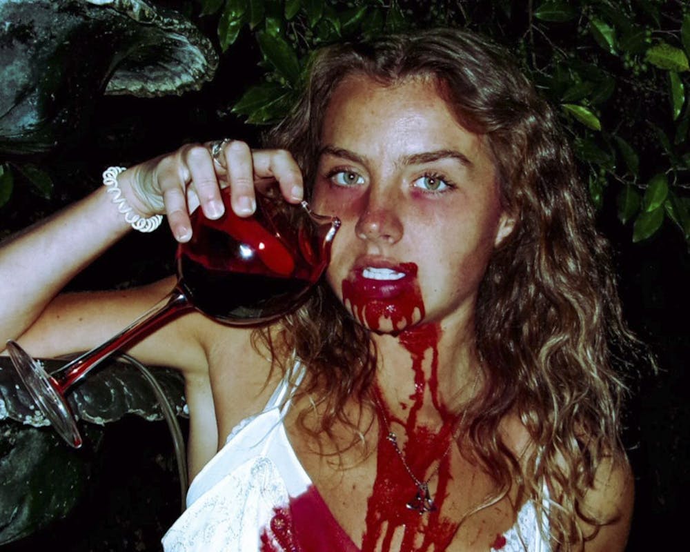 <p>The cover art of Miha Magazine's first issue, published on Oct. 28, 2022, depicts a woman drinking fake blood from a wine glass to fit the issue's Halloween theme. The magazine, created by third-year advertising student Ryan Manor, is student-run and emphasizes the importance of women in business and inclusivity.</p>