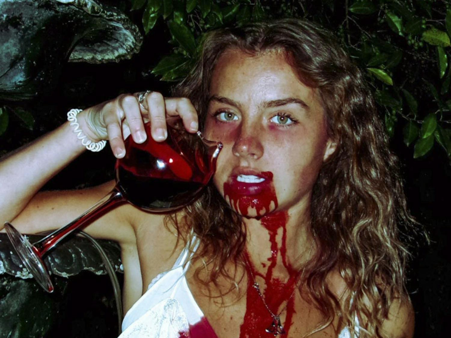 The cover art of Miha Magazine's first issue, published on Oct. 28, 2022, depicts a woman drinking fake blood from a wine glass to fit the issue's Halloween theme. The magazine, created by third-year advertising student Ryan Manor, is student-run and emphasizes the importance of women in business and inclusivity.