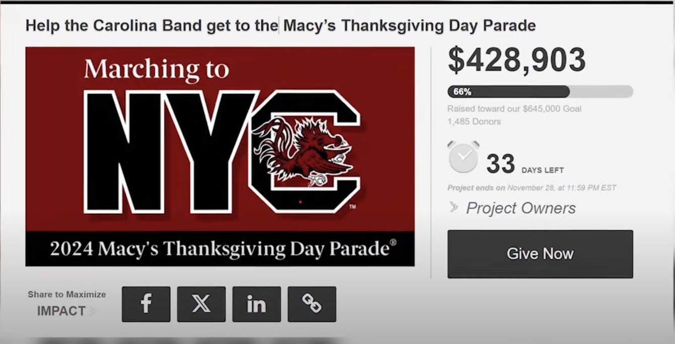 A screenshot shows a crowdfunding raise that asks for people to help get the Carolina Band to reach their money goal of $645, 000. The amount on the page shows that they have raised $428,903 at the time of the screenshot. 