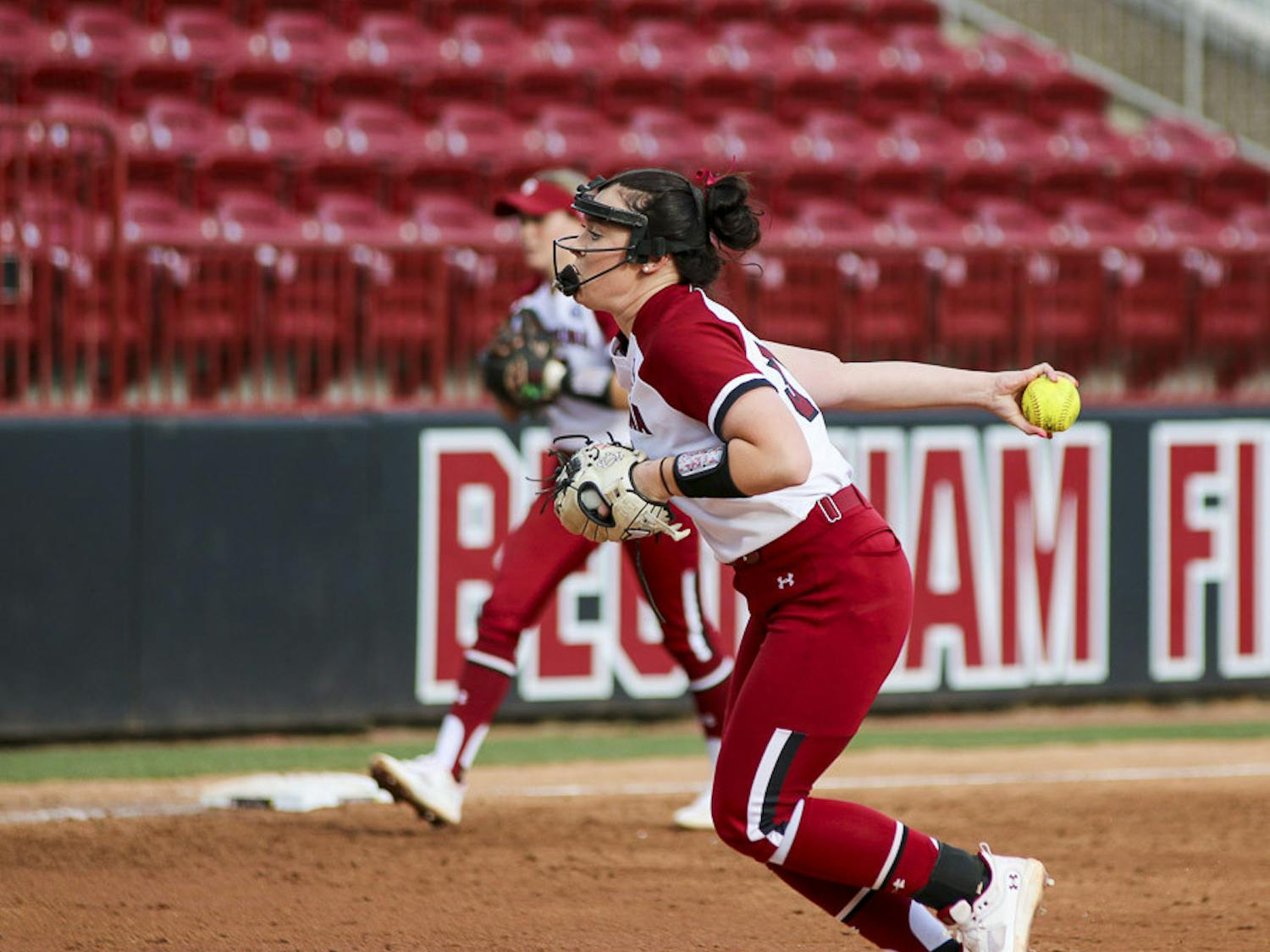 Senior pitcher Karsen Ochs winds up for a pitch during the match against Western Kentucky University at Beckham Field on Feb. 19, 2023. The Gamecocks beat the Hilltoppers 11-2.
