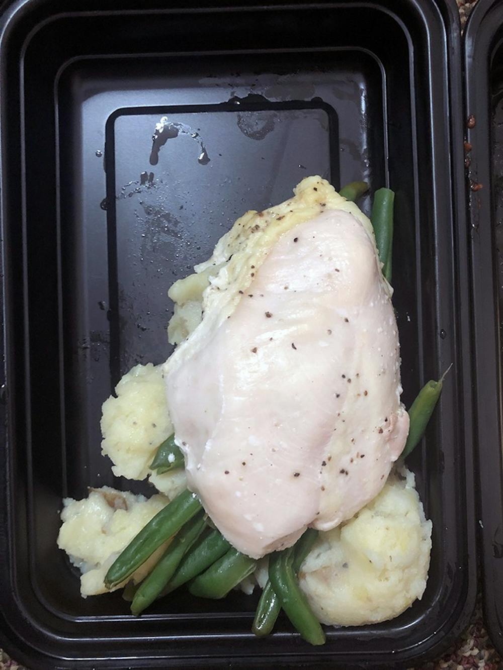 Quarantined students were given soggy chicken as part of their delivered meals.