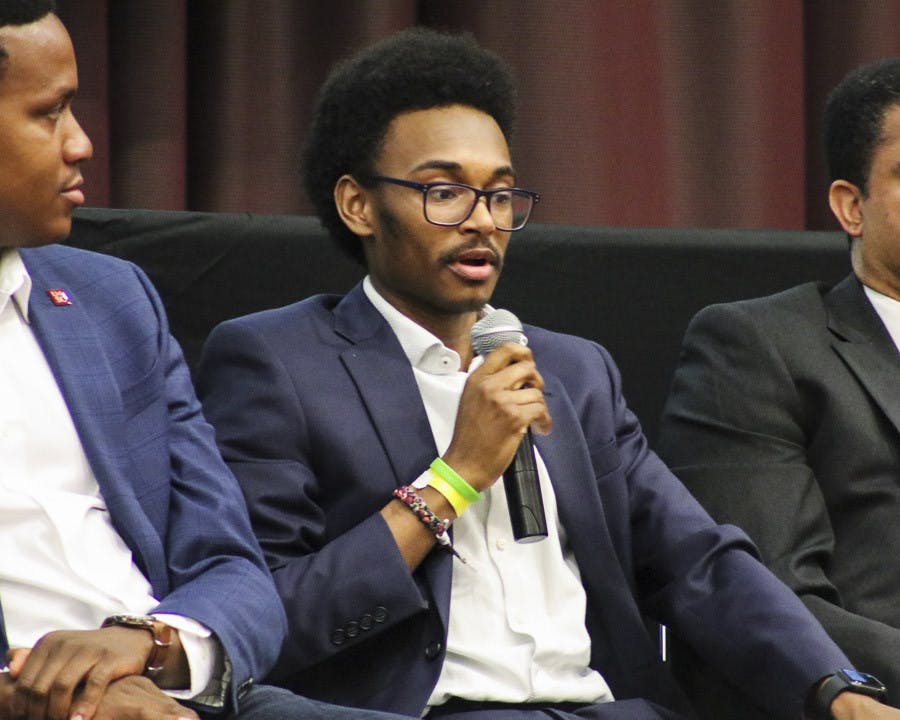 Aon Insurance Commercial Specialist and Diversity Consultant Josh Pearson talks about the importance of diversity in the workspace during the Alpha Kappa Psi panel in the Russell House Ballroom on Feb. 20, 2023. Pearson, a 2021 graduate from USC, told the audience how impressed he was to see such a diverse crowd in attendence of the event.&nbsp;