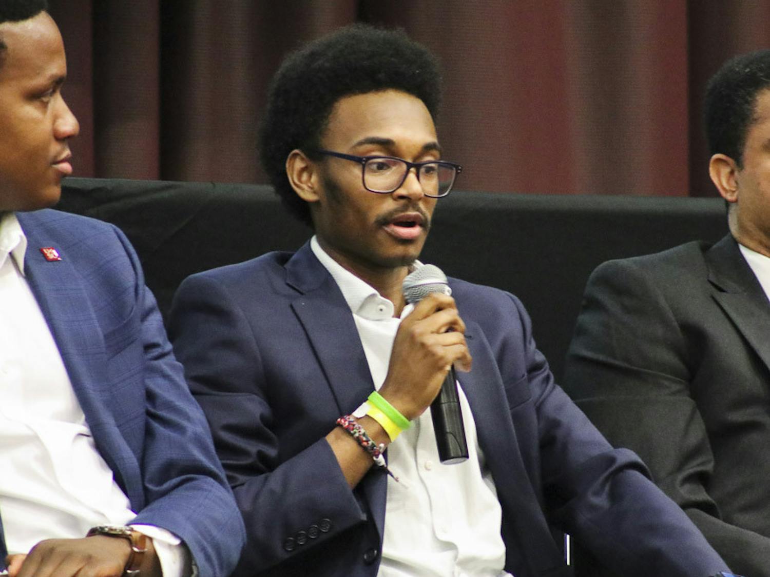 Aon Insurance Commercial Specialist and Diversity Consultant Josh Pearson talks about the importance of diversity in the workspace during the Alpha Kappa Psi panel in the Russell House Ballroom on Feb. 20, 2023. Pearson, a 2021 graduate from USC, told the audience how impressed he was to see such a diverse crowd in attendence of the event.&nbsp;