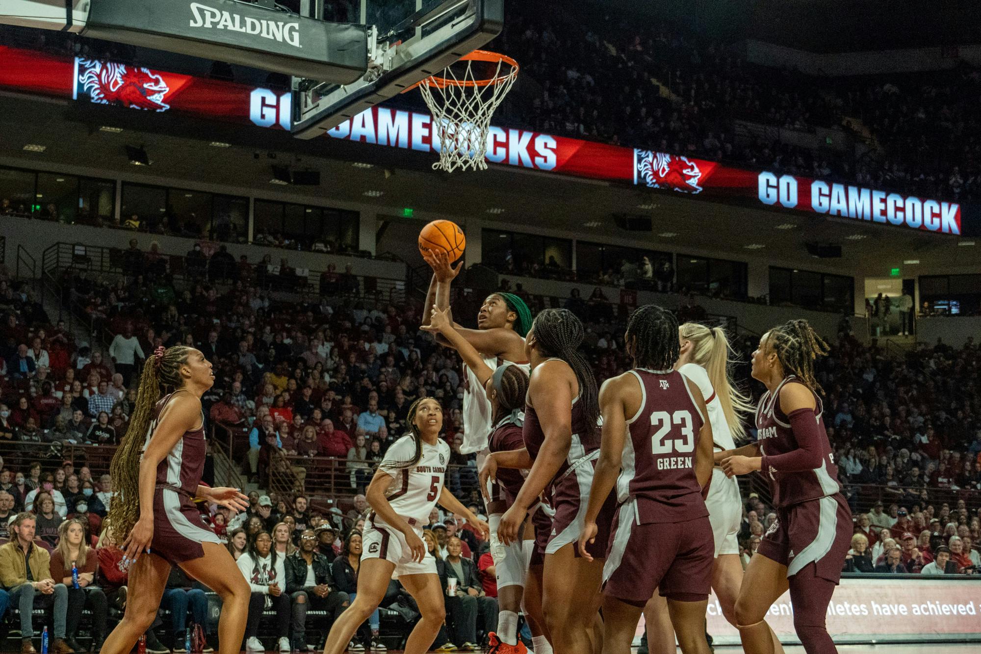 FILE—Senior forward Aliyah Boston leaps past defenders, scoring a layup for her team during a game against Texas A&amp;M on Dec. 29, 2022, at Colonial Life Arena. The victory marked the Gamecocks' first in-conference win of the season.