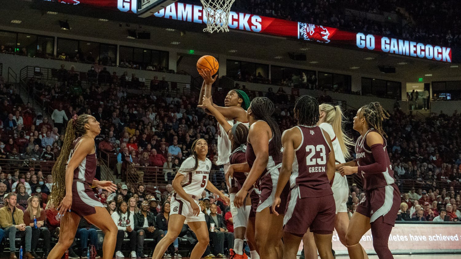 FILE—Senior forward Aliyah Boston leaps past defenders, scoring a layup for her team during a game against Texas A&amp;M on Dec. 29, 2022, at Colonial Life Arena. The victory marked the Gamecocks' first in-conference win of the season.