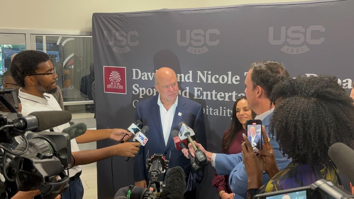 David (left) and Nicole (right) Tepper speak to the media after announcing their $5.24 million donation to the Department of Sport and Entertainment Management on Oct. 14, 2025. The department has been renamed to the David and Nicole Tepper Department of Sport and Entertainment Management.