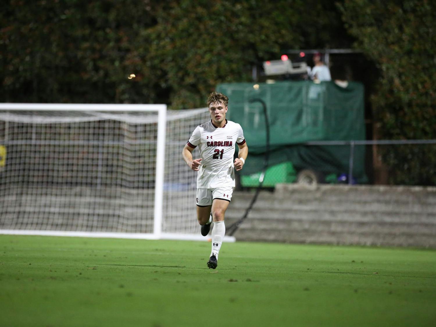 Freshman midfielder Jordan Illian runs down the field after the goalkeeper clears the ball to the other side of the field on Oct. 3, 2023. The Gamecocks beat the Dolphins 1-0. 
