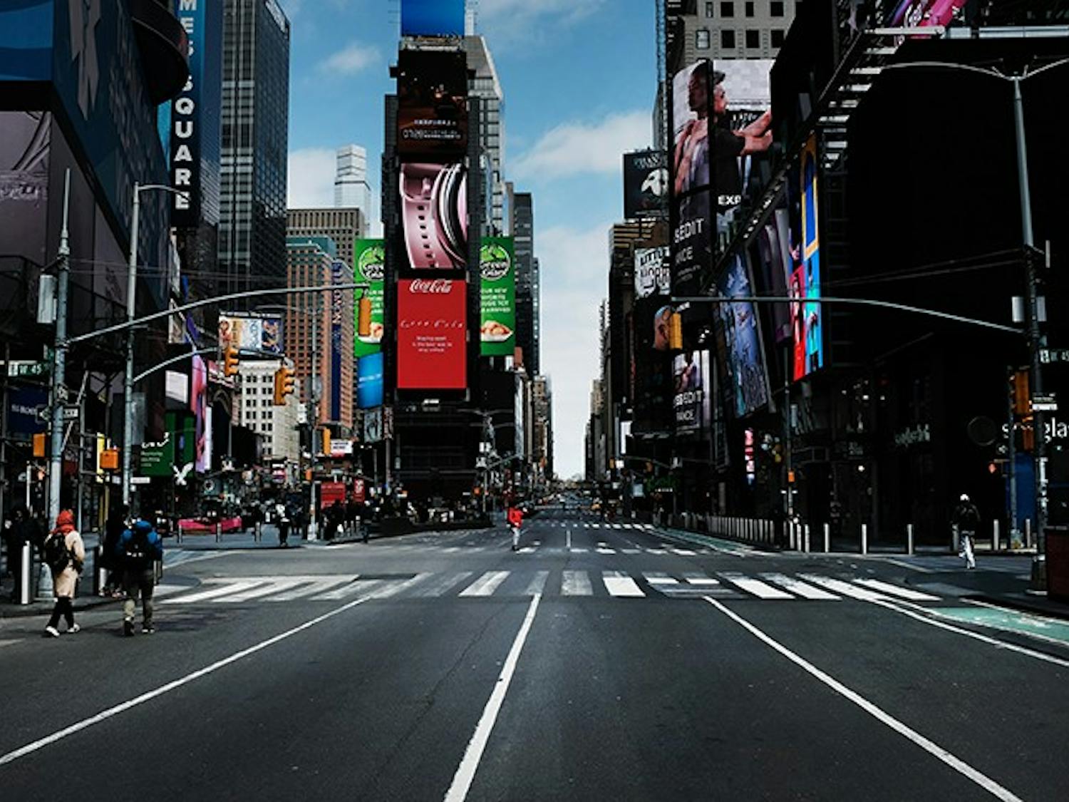 Times Square in New York stands mostly empty as as much of the city is void of cars and pedestrians amid the coronavirus pandemic, March 22, 2020.