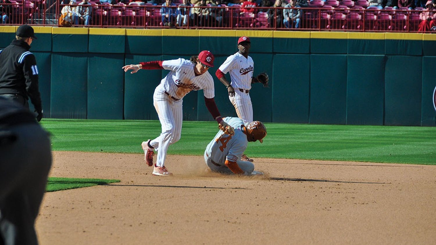 Junior infielder Braylen Wimmer attempts to catch Texas stealing second base on March 12, 2022. The Gamecocks beat the Longhorns, 3-2, during the series.
