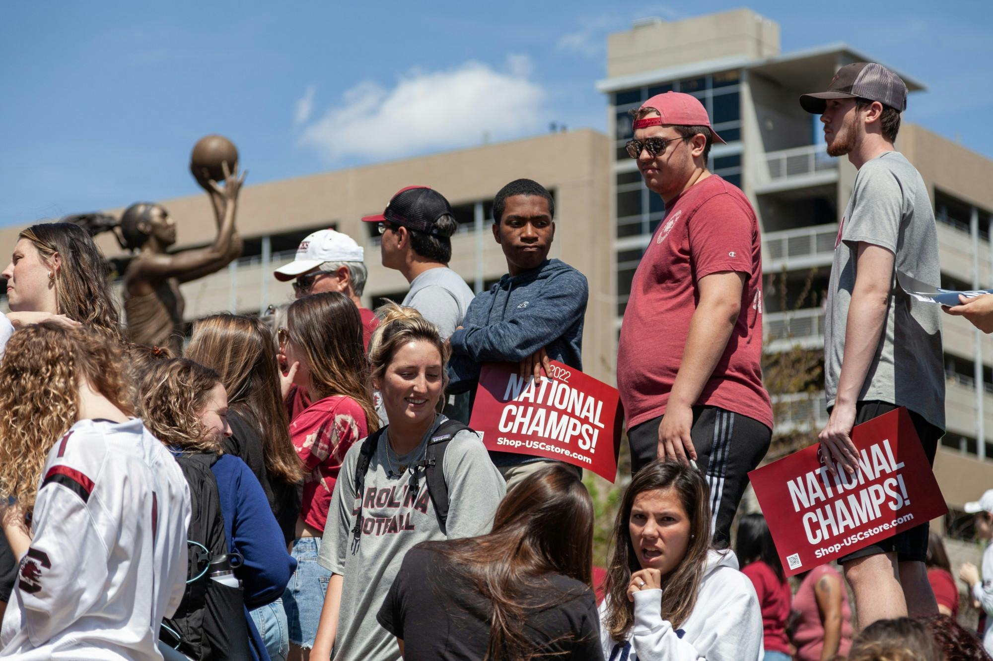South Carolina fans prepare for the women's basketball team to arrive at Colonial Life Arena in Columbia, SC on April 4, 2022. Fans crowded the arena before the team arrived.