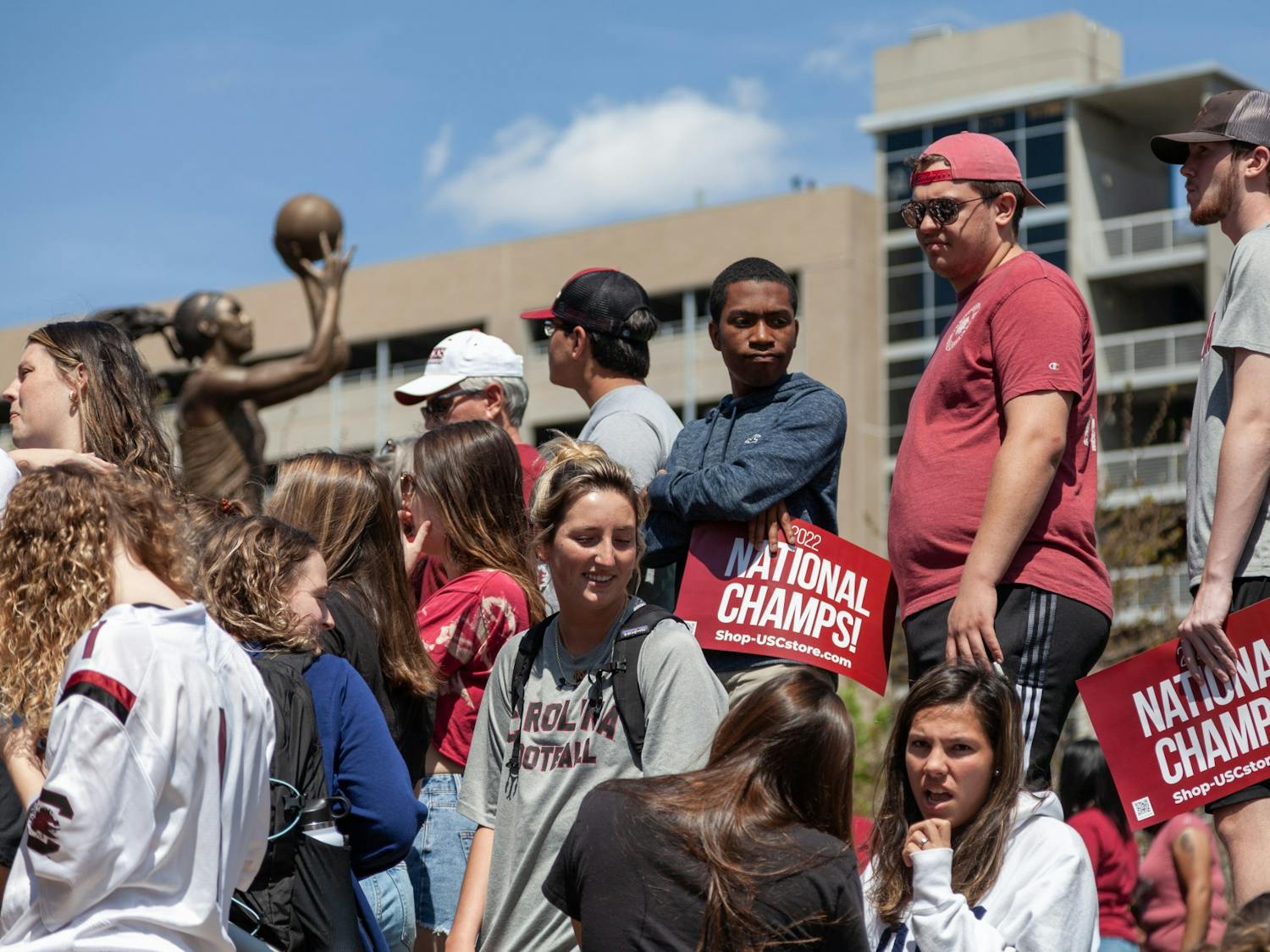 South Carolina fans prepare for the women's basketball team to arrive at Colonial Life Arena in Columbia, SC on April 4, 2022. Fans crowded the arena before the team arrived.