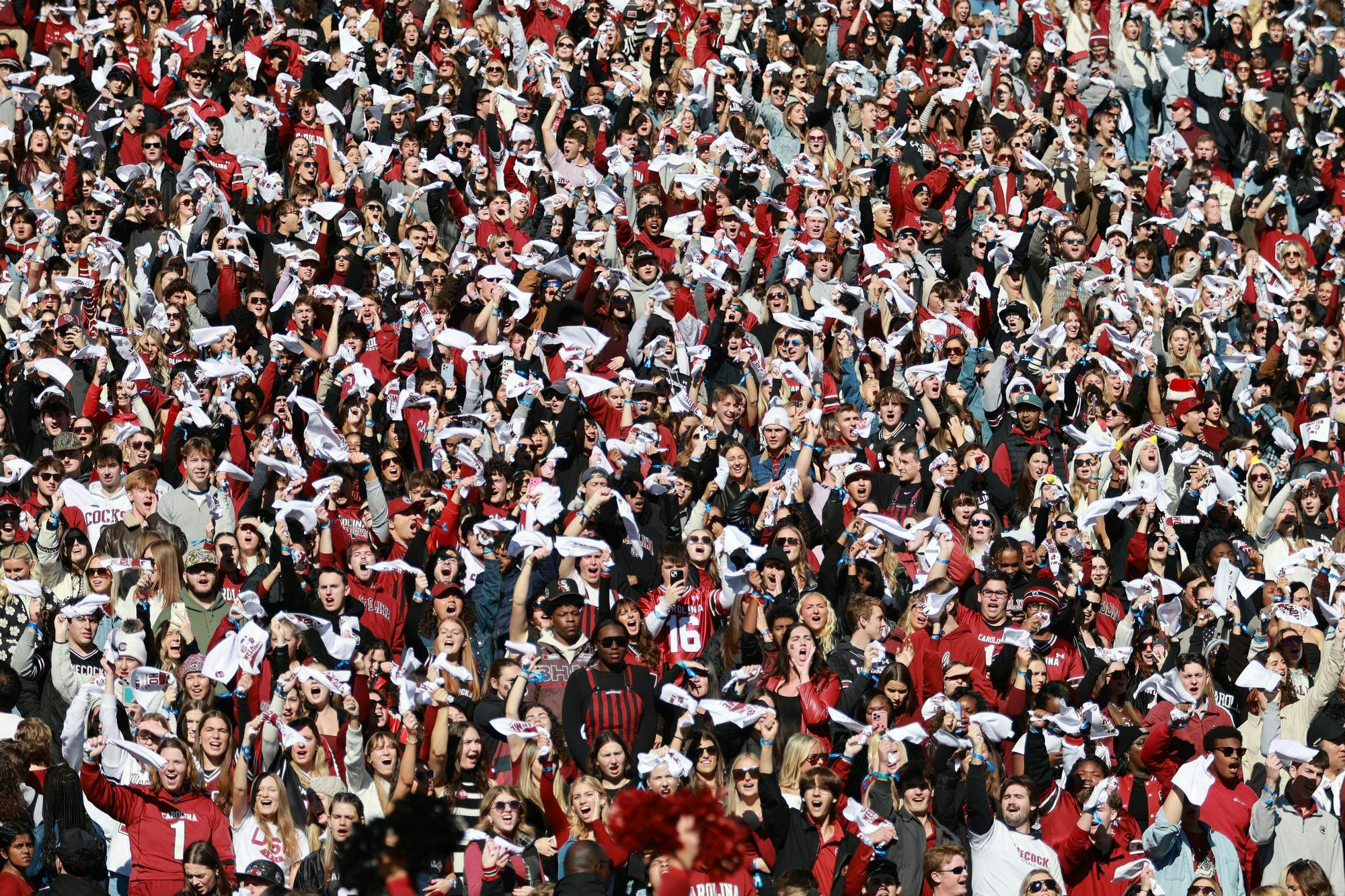 South Carolina students cheer and wave rally towels during the Gamecocks’ matchup against Clemson on Nov. 29, 2025, at Williams-Brice Stadium. The student section stays loud throughout the game, helping build the atmosphere in the stadium.