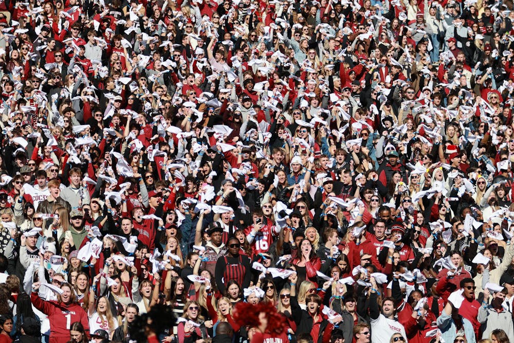 <p>South Carolina students cheer and wave rally towels during the Gamecocks’ matchup against Clemson on Nov. 29, 2025, at Williams-Brice Stadium. The student section stays loud throughout the game, helping build the atmosphere in the stadium.</p>
