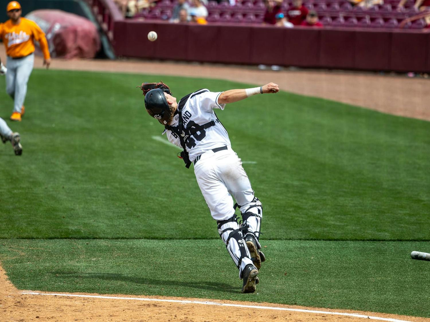 Freshman catcher Gavin Braland attempts to catch a pop fly ball in foul territory during South Carolina's game against No. 1 Tennessee on March 30, 2025, at Founders Park. The Gamecocks are 17-12 (1-8 SEC) on the season.
