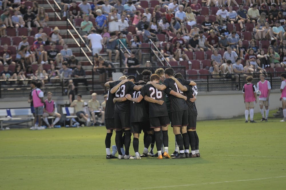 <p>South Carolina men's soccer team huddle in a group.&nbsp;</p>