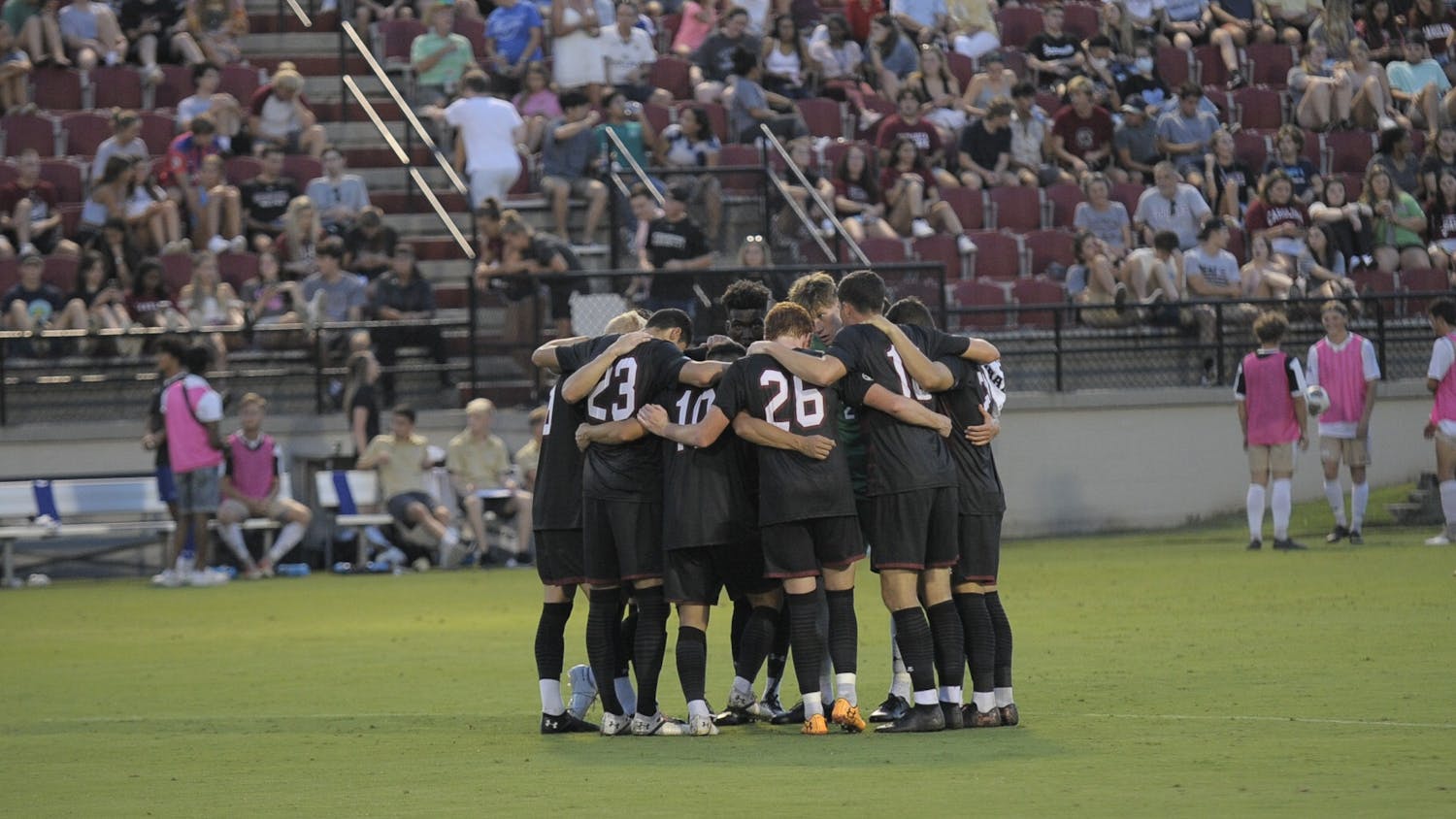 South Carolina men's soccer team huddle in a group.&nbsp;