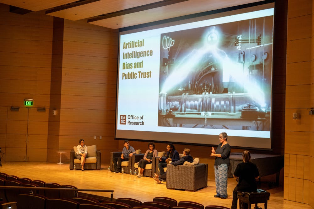 A wide shot of the AI Panel that met in the Johnson Hall at the Darla Moore School of Business on Thursday night, Oct. 6, 2022. The panel met to discuss advancements in AI technology and how these advancements might impact the world.