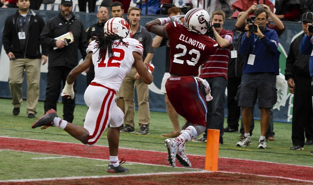 	Junior wide receiver Bruce Ellington wiggles his way into the endzone for one of his two touchdowns in the Gamecocks&#8217; 34-24 win over Wisconsin in the 2014 Capital One Bowl. 