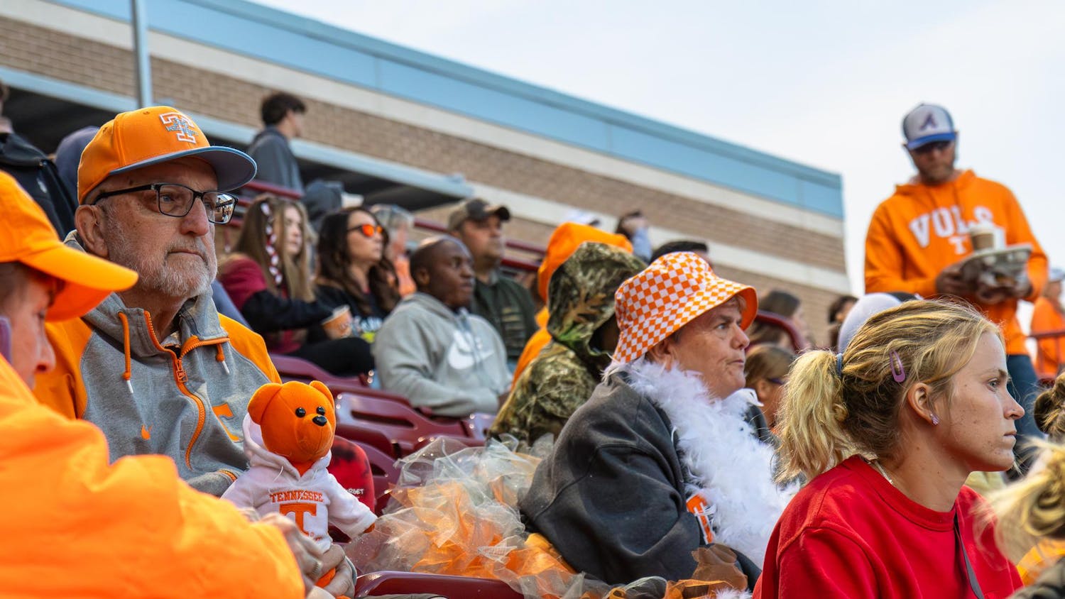 University of Tennessee fans Don Erdman (left) and Cathy “Tutu” Adrian watch the game against the University of South Carolina at Beckham Field on March 24, 2024. The pair from Orlando, Florida, often travel to watch the Volunteers play. Erdman is a former head coach of the University of New Orleans softball team and is close with the Volunteers coaching staff.