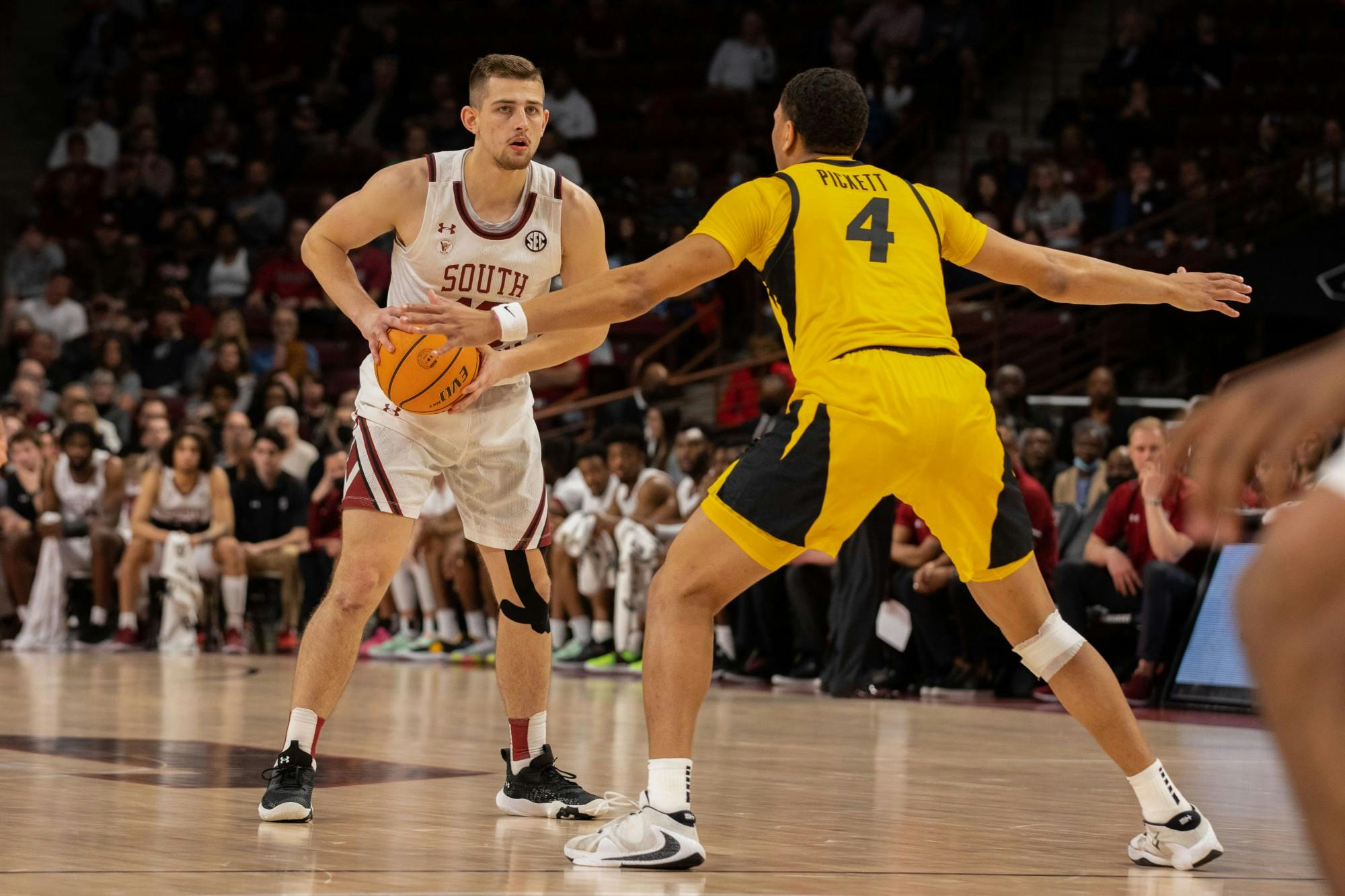 Senior Erik Stevenson faces off against Missouri opponent at the men’s basketball game on Tuesday, March 1, 2022. South Carolina defeated Missouri 73-69.