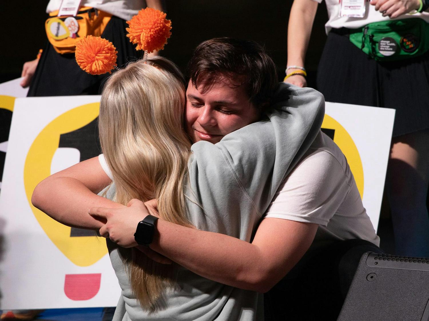 The Dance Marathon main event took place on Saturday, Feb. 24, 2024, at Strom Thurmond Wellness and Fitness Center. Two students happily hug after the reveal of the total funds raised for Prisma Health Children's Hospital - Midlands, USC Dance Marathon's partner hospital.