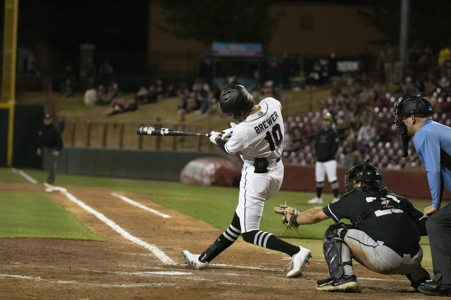 Senior outfielder Dylan Brewer battles at the plate to get on base and extend the South Carolina lead over USC Upstate. With home runs from Brewer and freshman outfielder Ethan Petry, the Gamecocks won Tuesday night’s game against the Spartans 7-2.