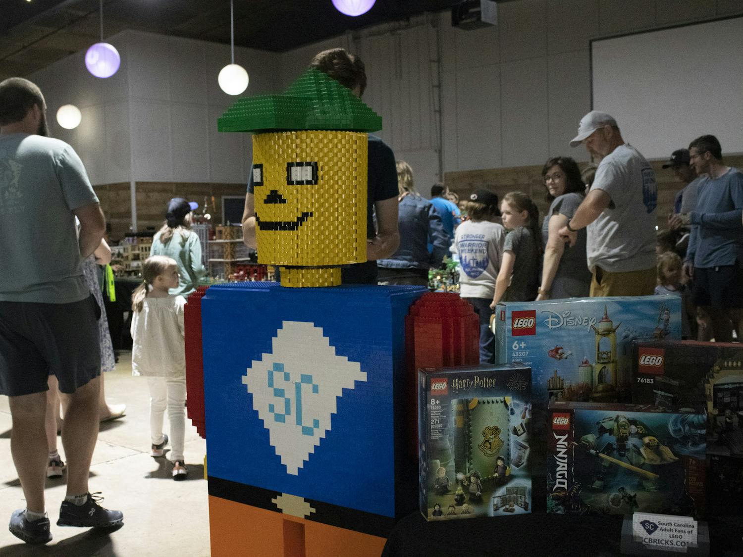 The S.C. Bricks LEGO User Group convention has its life-size character at the entrance to welcome attendees on March 25, 2023. S.C. Bricks held a raffle to help raise funds to cover the cost of the convention.&nbsp;