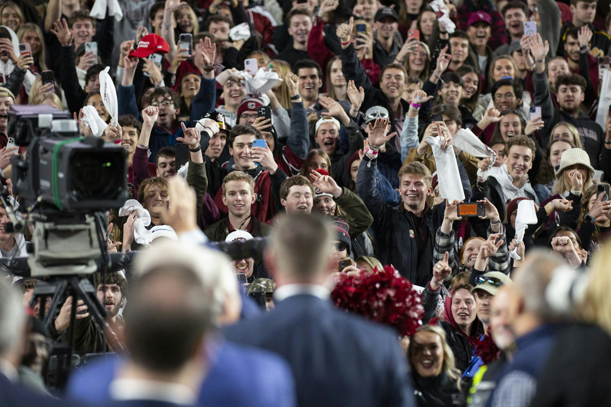 FILE — The Gamecock student section at Williams-Brice Stadium gives 45th President Donald Trump and South Carolina Governor Henry McMaster a mixture of praise and dismay on Nov. 25, 2023. While many were excited to see the former president, there were many less than thrilled as well.
