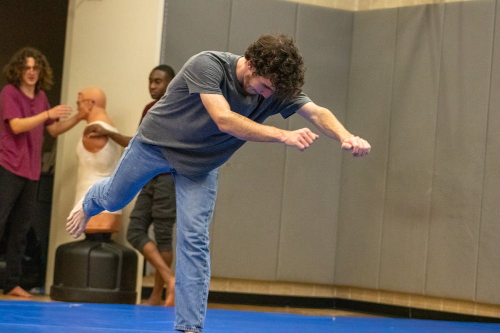 <p>A member of the Carolina Movement Club practices parkour techniques at Strom Thurmond Wellness and Fitness Center on Feb. 17, 2022. The Carolina Movement Club meets twice a week to encourage safe development of skills.</p>