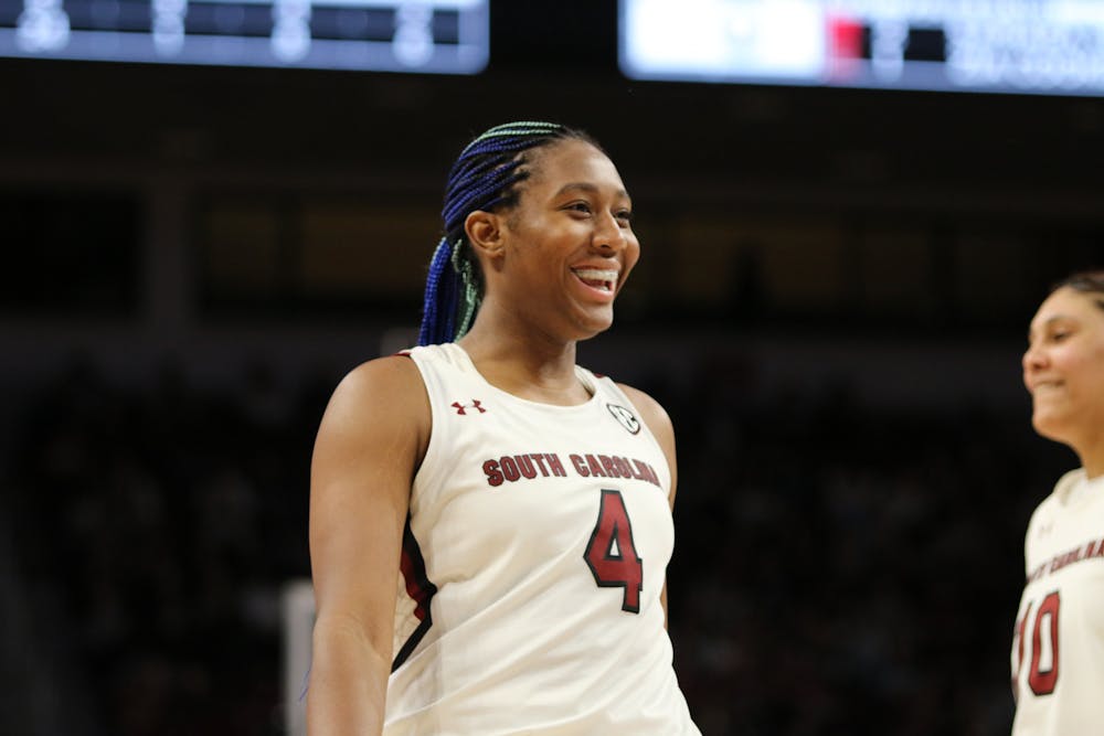 <p>FILE—Senior forward Aliyah Boston laughs with her teammates during warmups on Jan. 22, 2023. The Gamecocks defeated the Razorbacks 92-46.&nbsp;</p>
