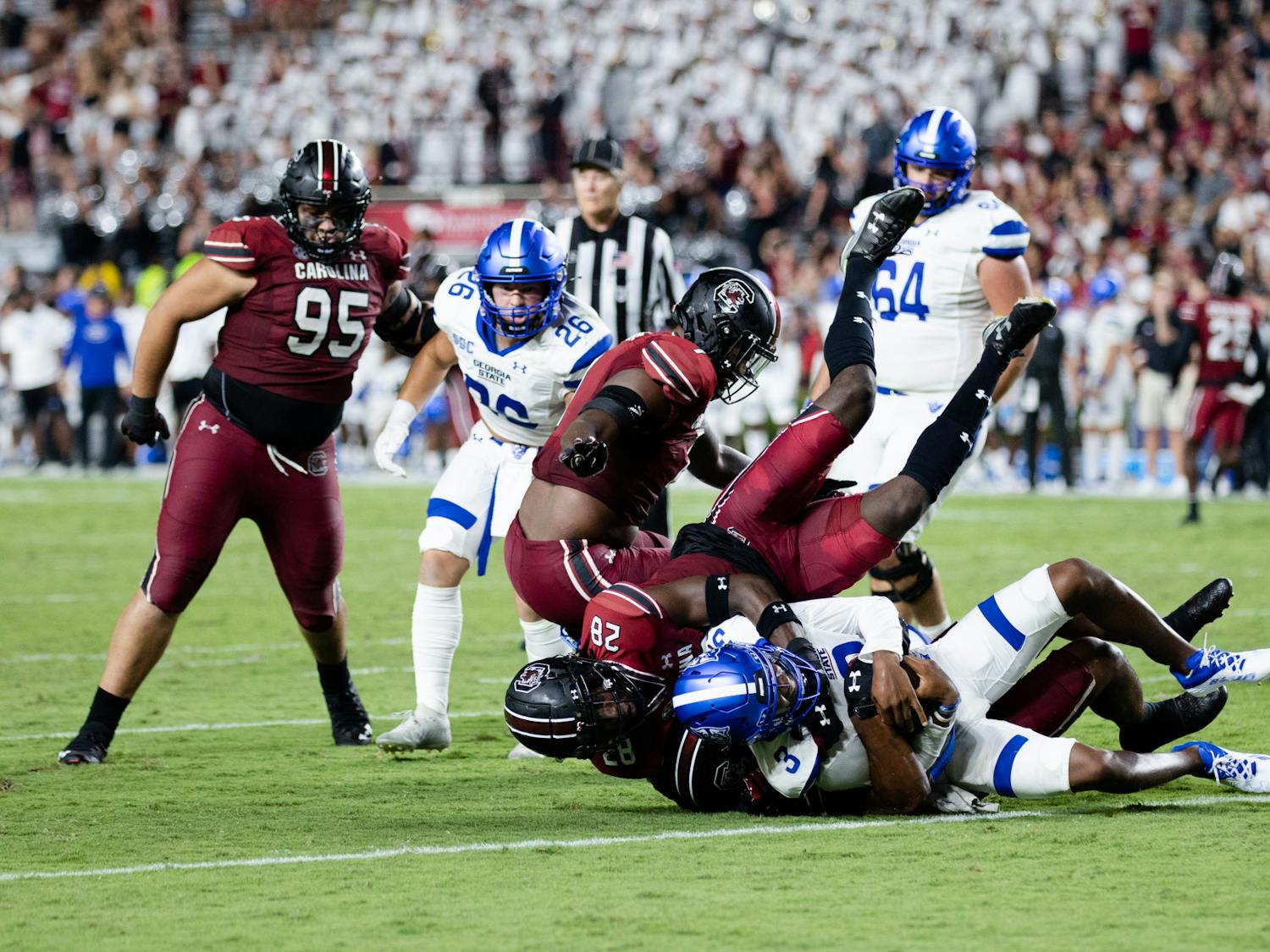 Redshirt senior defensive back Darius Rush tackles his opponent during a game against Georgia State on Sept. 3, 2022. The Gamecocks won 35-14.&nbsp;