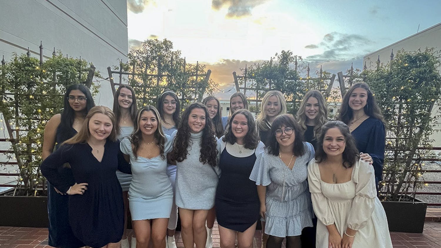 Members of The Cocktails pose outside of the Koger Center for the Arts after their winter recital on Dec. 2, 2022. The all-female a capella group is organized and ran by students who perform live events around Columbia and release their content online.