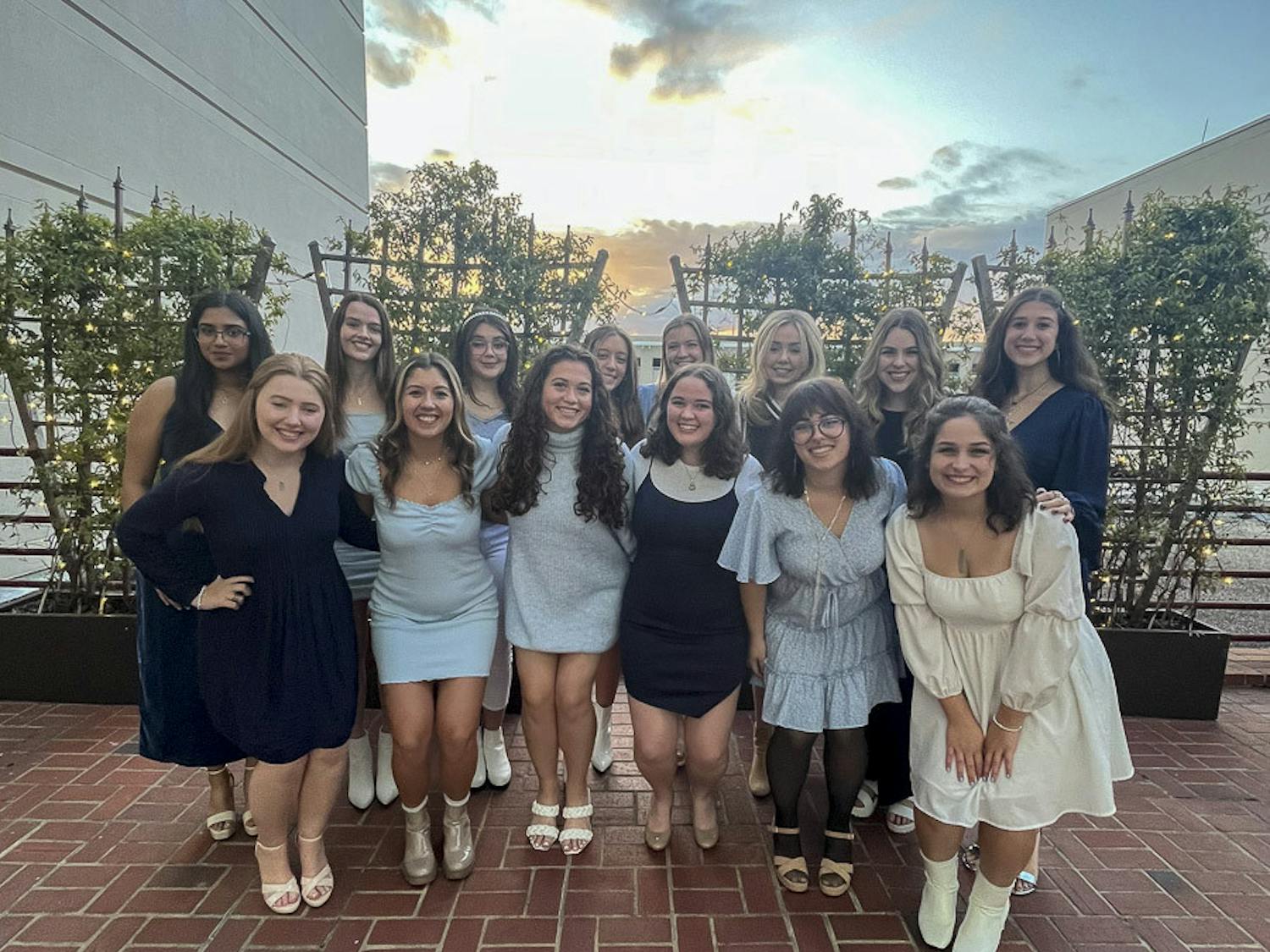 Members of The Cocktails pose outside of the Koger Center for the Arts after their winter recital on Dec. 2, 2022. The all-female a capella group is organized and ran by students who perform live events around Columbia and release their content online.