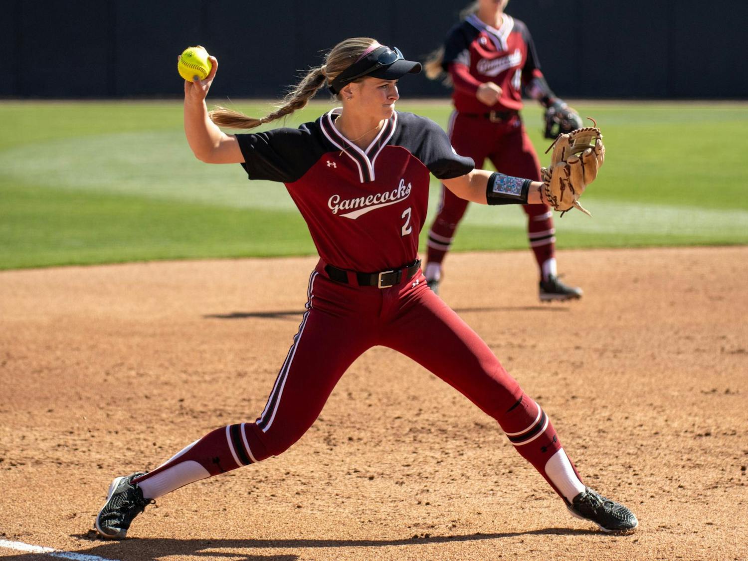Senior infielder Ella Chancey throws the ball to first in an attempt to throw out the Texas Tech runner on March. 22, 2025. Chancey has 14 putouts on the season.