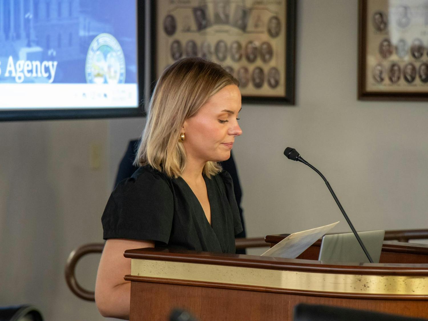 A woman speaks at the podium during the public hearing for S.B. 323 at Gressette Building on Oct. 1, 2025. People from all over South Carolina came to voice both their support and opoosition for the bill.
