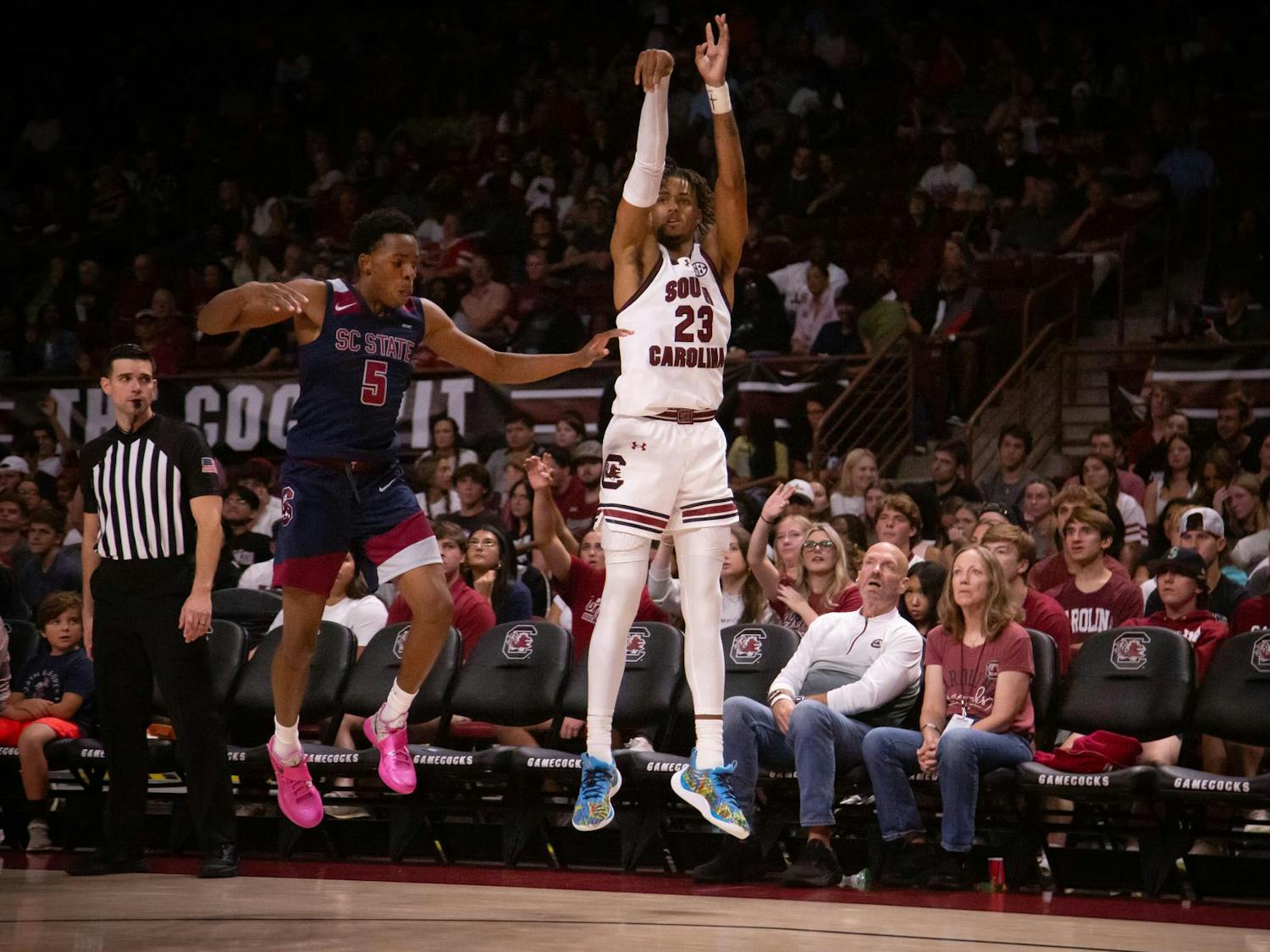 Freshman guard Cam Scott shoots a 3-pointer against South Carolina State University on Nov. 8, 2024 at Colonial Life Arena. Scott ended his 18 minutes of play with 6 points and 3 rebounds for the Gamecocks.
