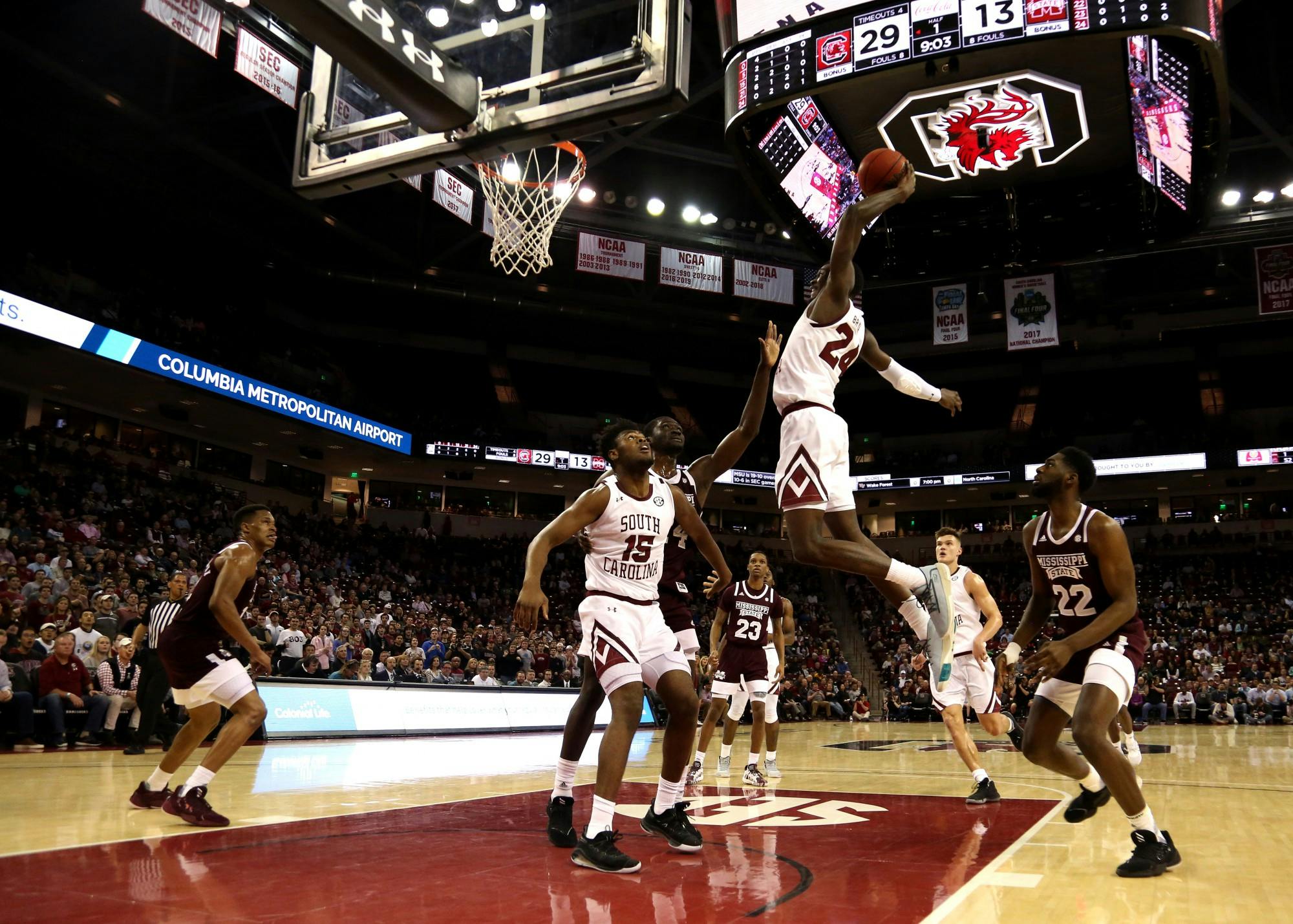 Sophomore forward Keyshawn Bryant dunks the ball during the game against Mississippi State on March 3, 2020.
