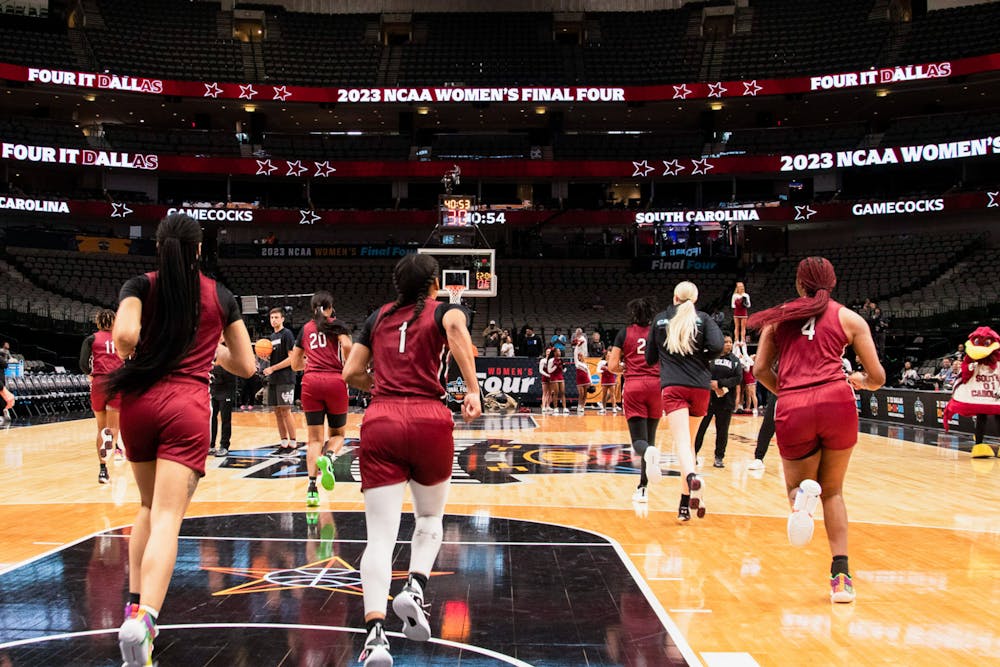 <p>FILE—The Gamecocks stride down the court for warm-ups during their open practice at the Women’s Final Four on March 30, 2023. This is the Gamecocks third consecutive appearance in the Final Four.</p>